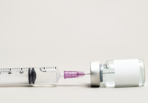 Blank white label on medicine bottle glass vial for injection